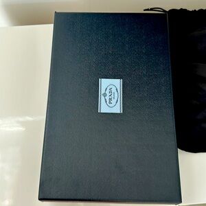 Prada box and dusty bag